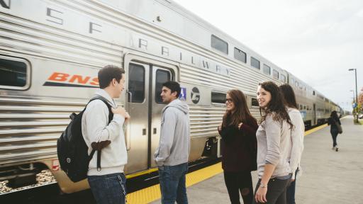students at train station